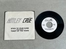 MOTLEY CRUE STICK TO YOUR GUNS / TOAST OF THE TOWN 7