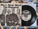 Damned Neat Neat Neat 18/02/77 BUY10 Four Prong Push Out Centre Island Logo Cℹ️