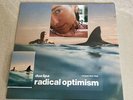 Dua Lipa: Radical Optimism Bundle Curacao Blue Vinyl Cassette Signed Art Card  ￼