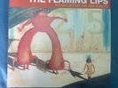 Yoshimi Battles the Pink Robots by The Flaming Lips (Record, 2002)