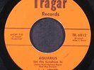 J. J. JONES / L. DANIELS: aquarius / nitecap TRAGAR 7