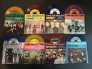 Eight Beatles Colored Vinyl Deccagone 45 RMP Records with Picture Sleeves