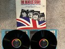 The Beatles' Story (Capitol black/rainbow label): EX vinyl