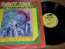 Trinity Shanty Town Determination JA TR INTERNATIONAL LP VG