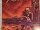 “Peace Sells… But Who’s Buying?” by Megadeth (Vinyl 1986) Combat Records