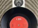 U2 -A Celebration- Irish 7” Red/White Labels, Translucent Vinyl/Double Dip Centr