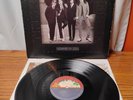 KISS Dressed To Kill 1975 Vinyl Record LP Embossed Cover Bogart Label NBLP 7016
