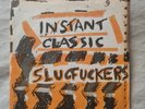 Slugfuckers. Instant Classic 7 sleeve for their punk EP. No disc is included.