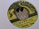 Desmond Young , Warning  , 7”Rising.