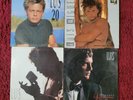 Luis Miguel / Busca Una Mujer /20 años / romance / segundo romance