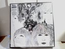 the BEATLES REVOLVER SUPER DELUXE 4 LP 180 GRAM WITH 100 PAGE FACTORY SEALED