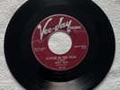 Jimmy Reed on Vee-Jay 119 “Boogie in the Dark”