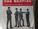 Beatles, She Loves You 45 rpm with photo sleeve, Swan S-4152