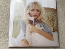 Sabrina Carpenter Man’s Best Friend Pink Champagne Liquid Vinyl LP.